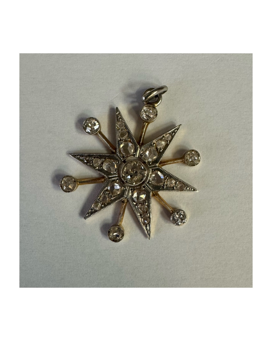 14K gold starburst pendant set with old- cut Diamonds