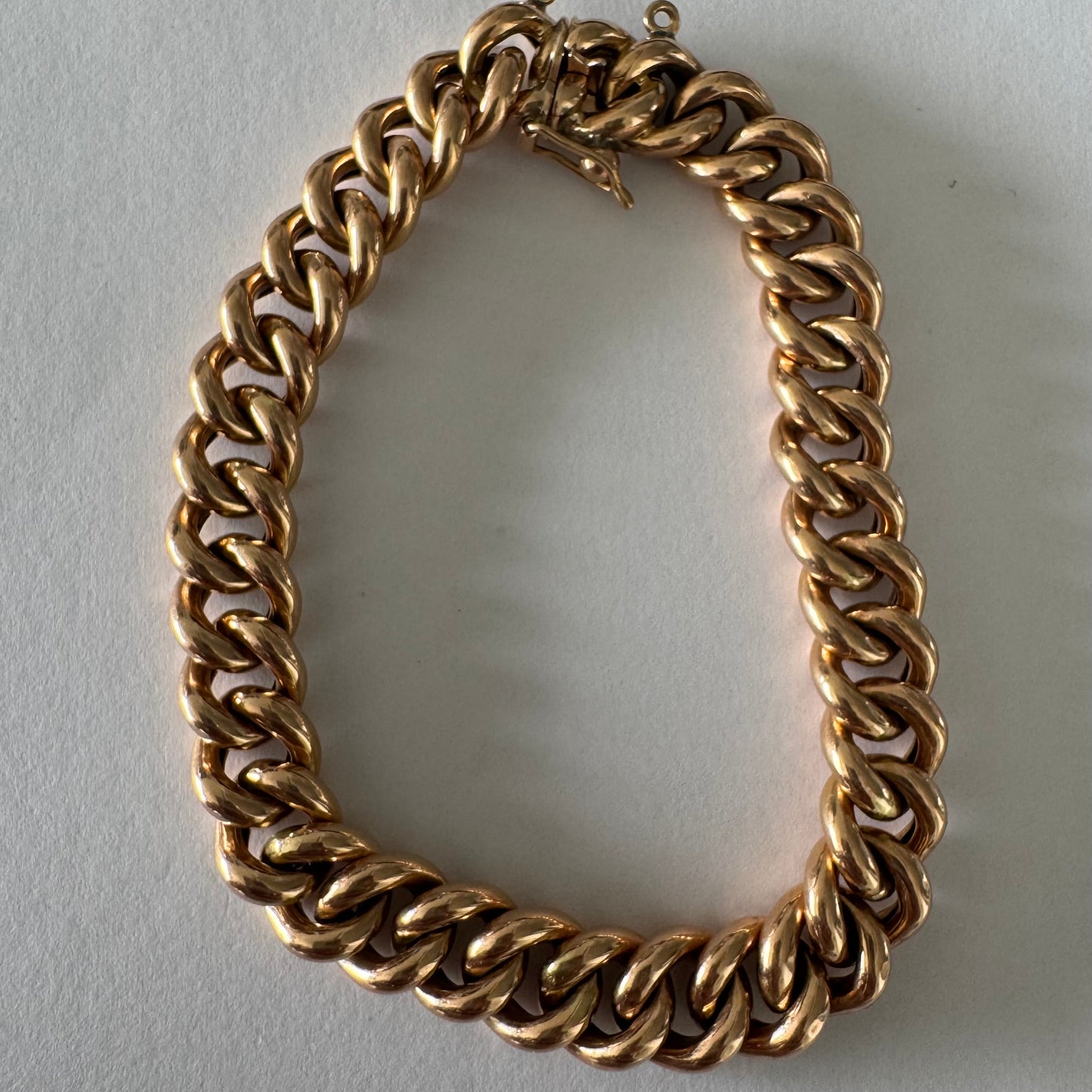 14K gold chain bracelet featuring bold, classic link design.