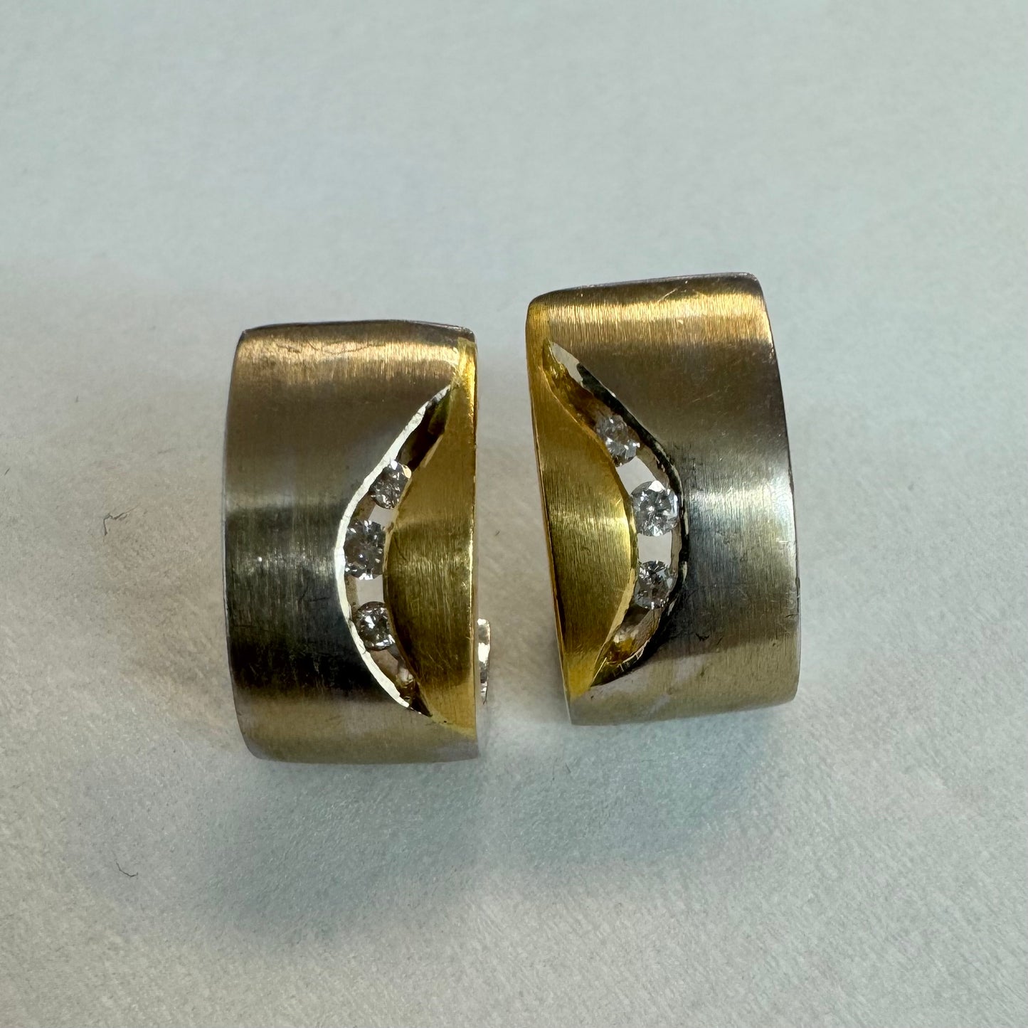 18K gold earrings set with Diamonds