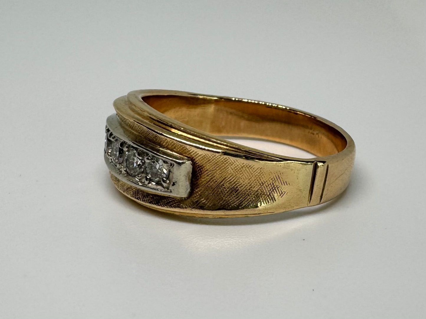 14K gold ring set with Diamonds