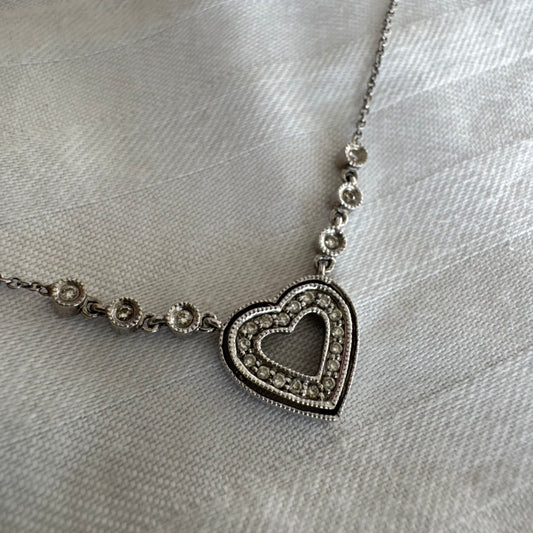 14K gold necklace set with Diamonds, featuring a delicate and romantic heart design.