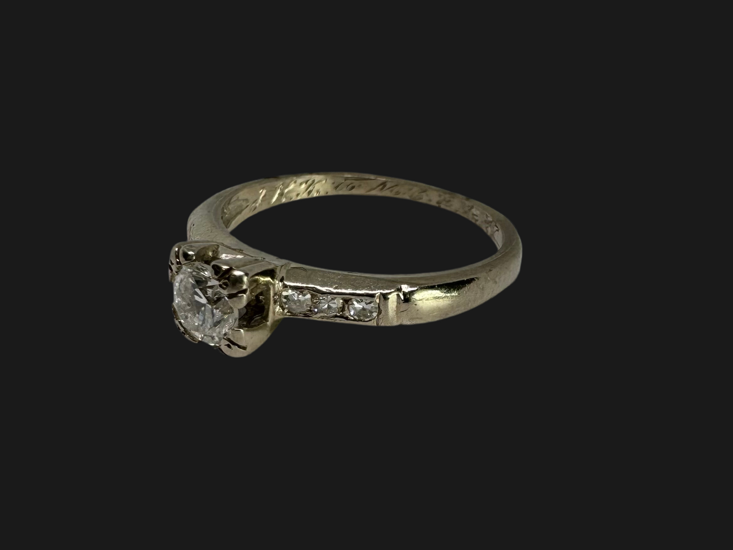 14K gold ring set with Diamonds