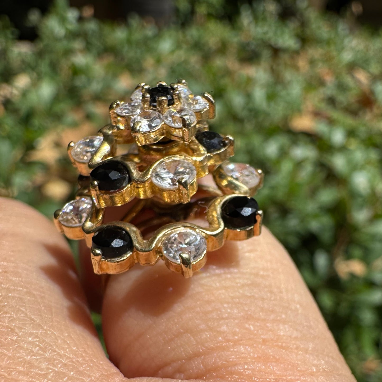 14K gold kinetic cocktail ring set with black and transparent stones