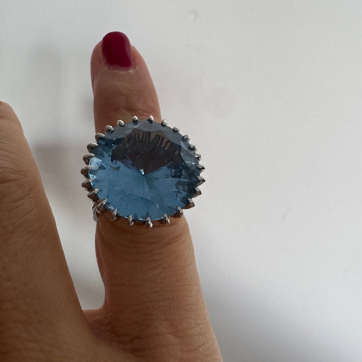 14K gold statement ring set with a large Blue Topaz stone