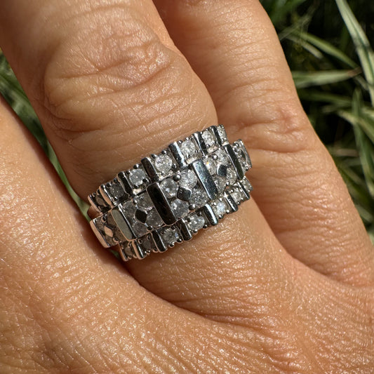 10K gold ring featuring a bold, structured design set with Diamonds