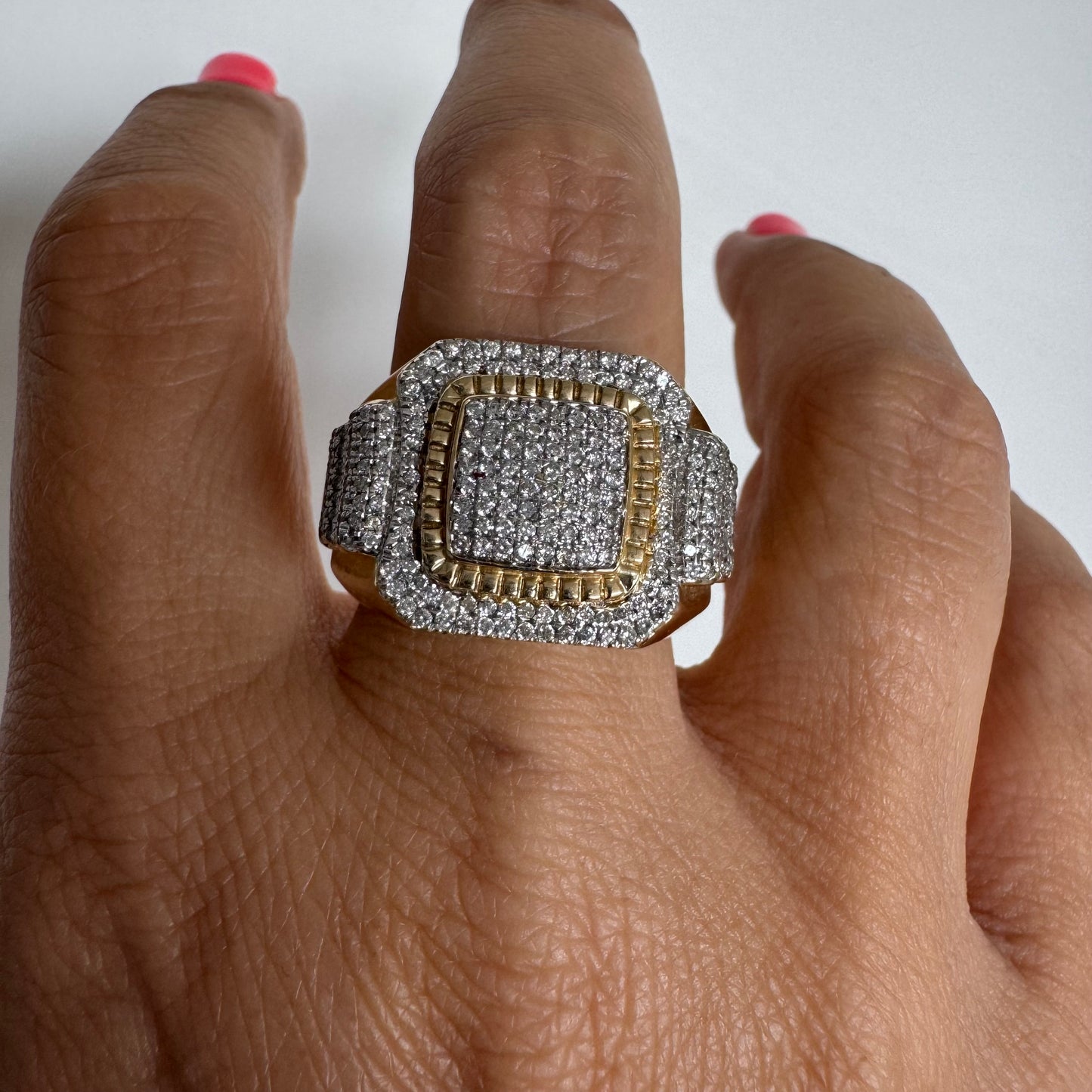 10K gold ring set with sparkling Diamonds in a bold geometric design.