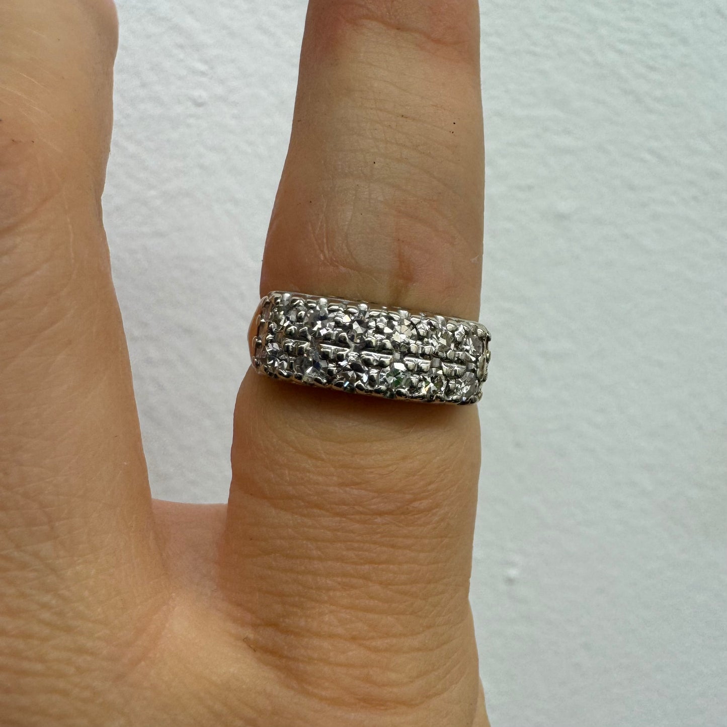 9K (14K) gold ring set with Diamonds in a bold, wide-band design.