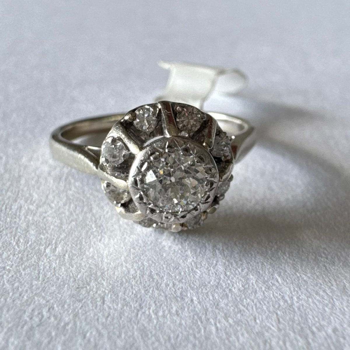 18K gold ring set with Diamonds in     a classic cluster-style