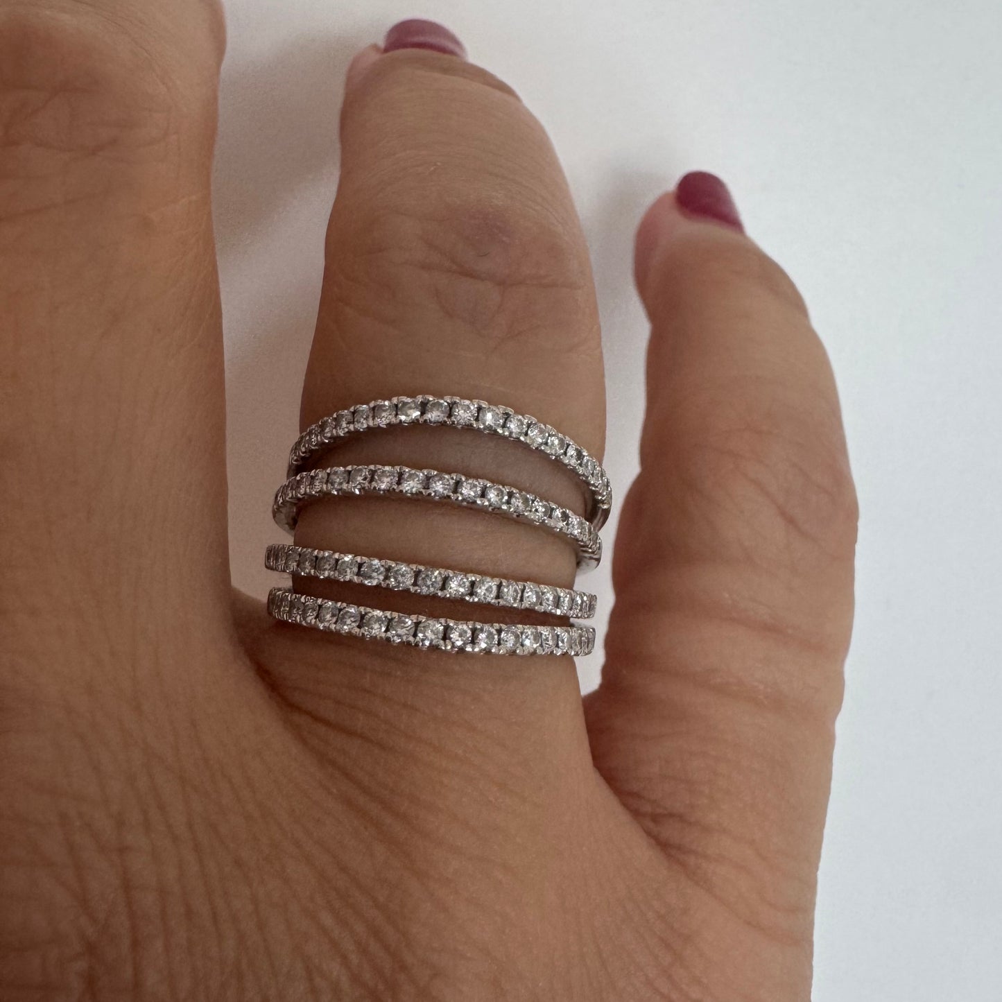 14K gold ring designed with multiple rows of sparkling Diamonds