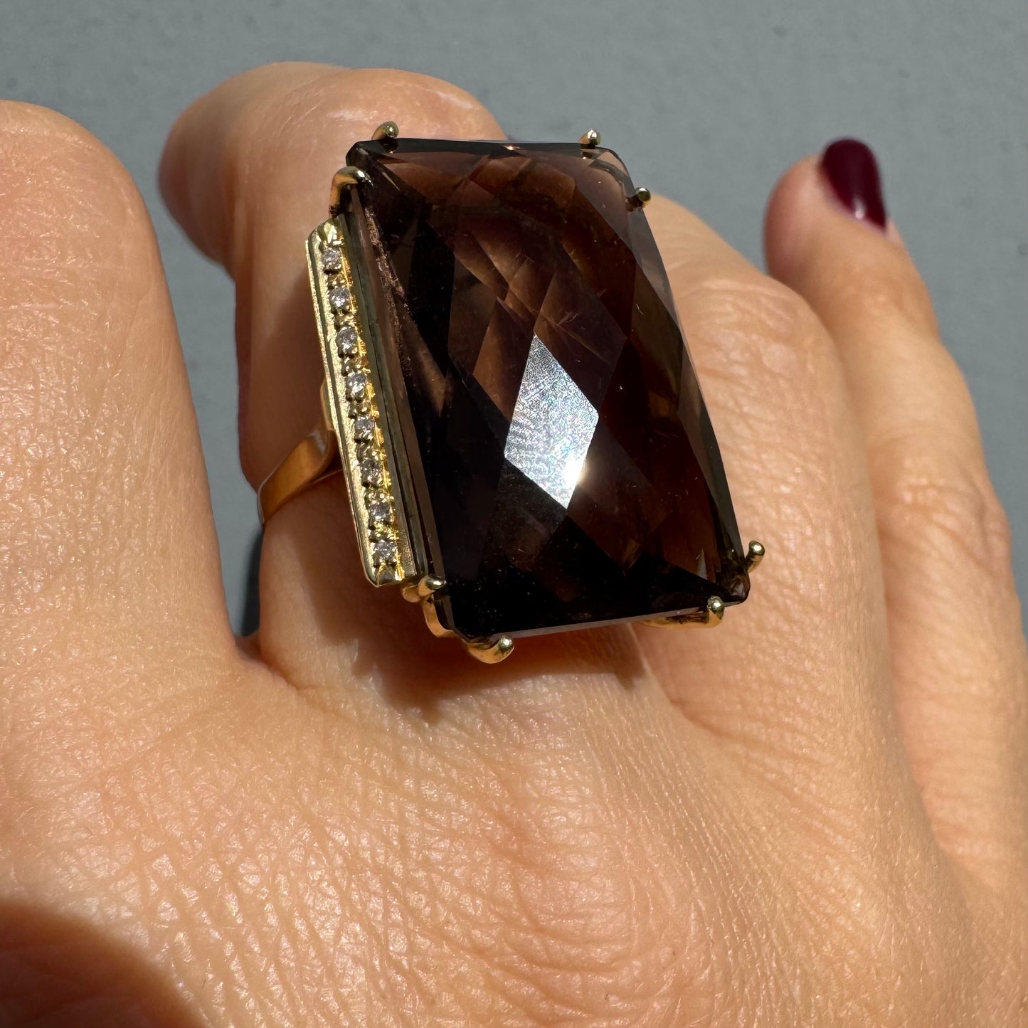 18K gold statement ring set with an oversized rectangular faceted Smoky Quartz center stone & Diamonds