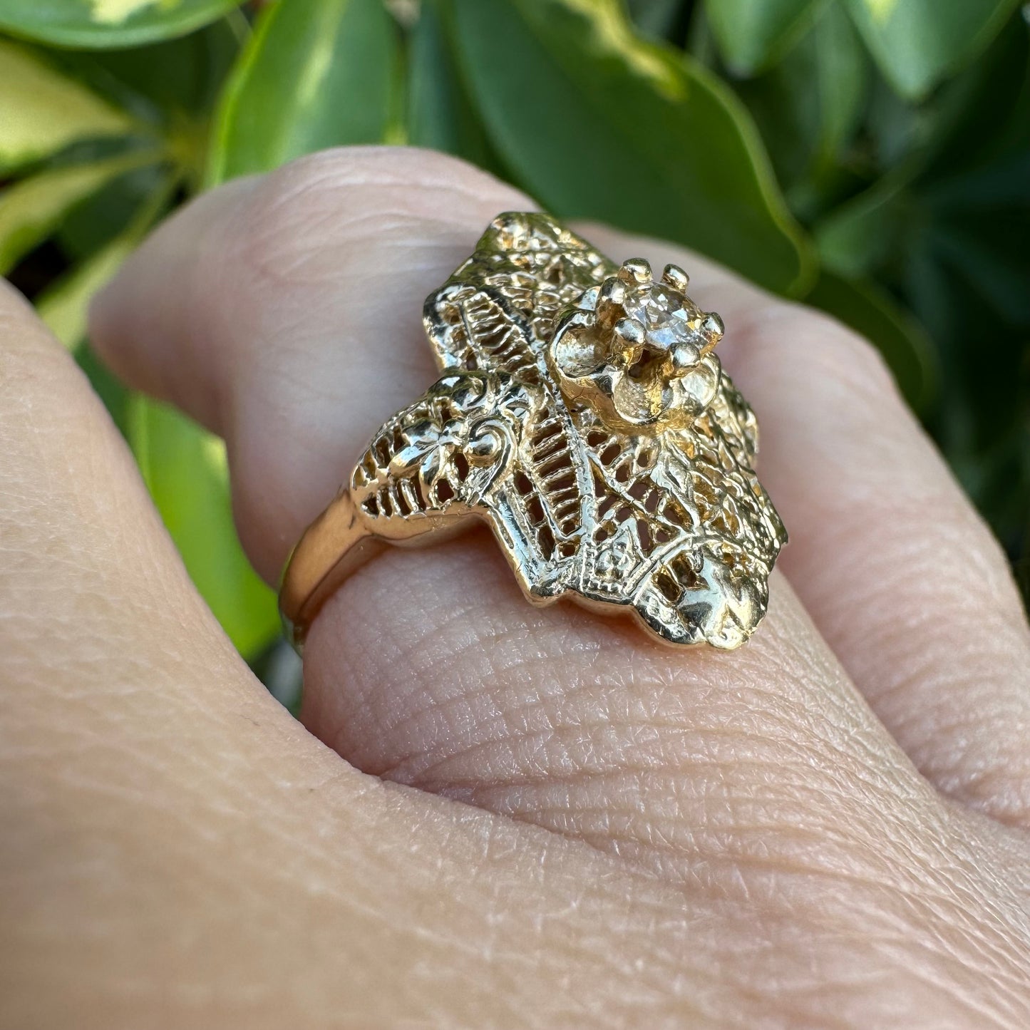 14K gold ring set with a Diamond