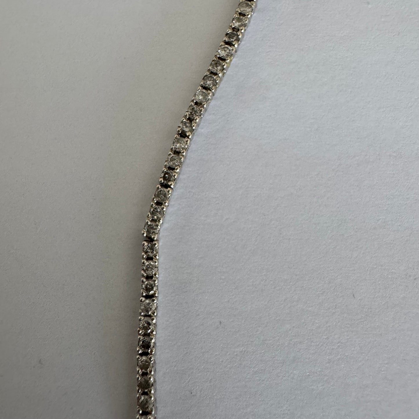 14K gold diamond bracelet with a sleek & elegant design.