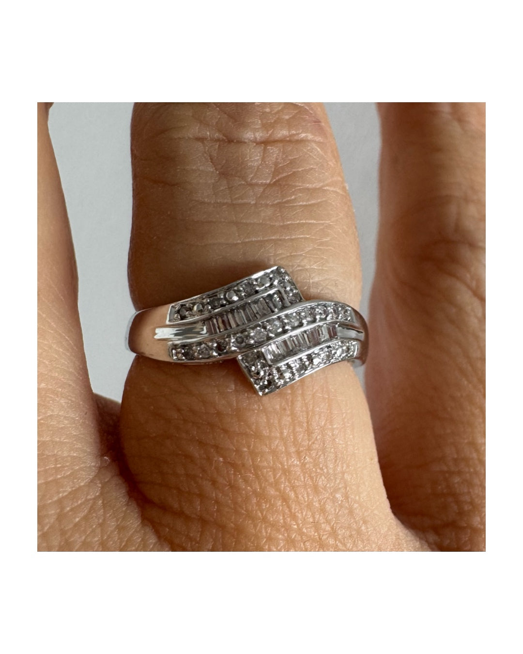 9K gold ring set with natural Diamonds in a unique geometric design.