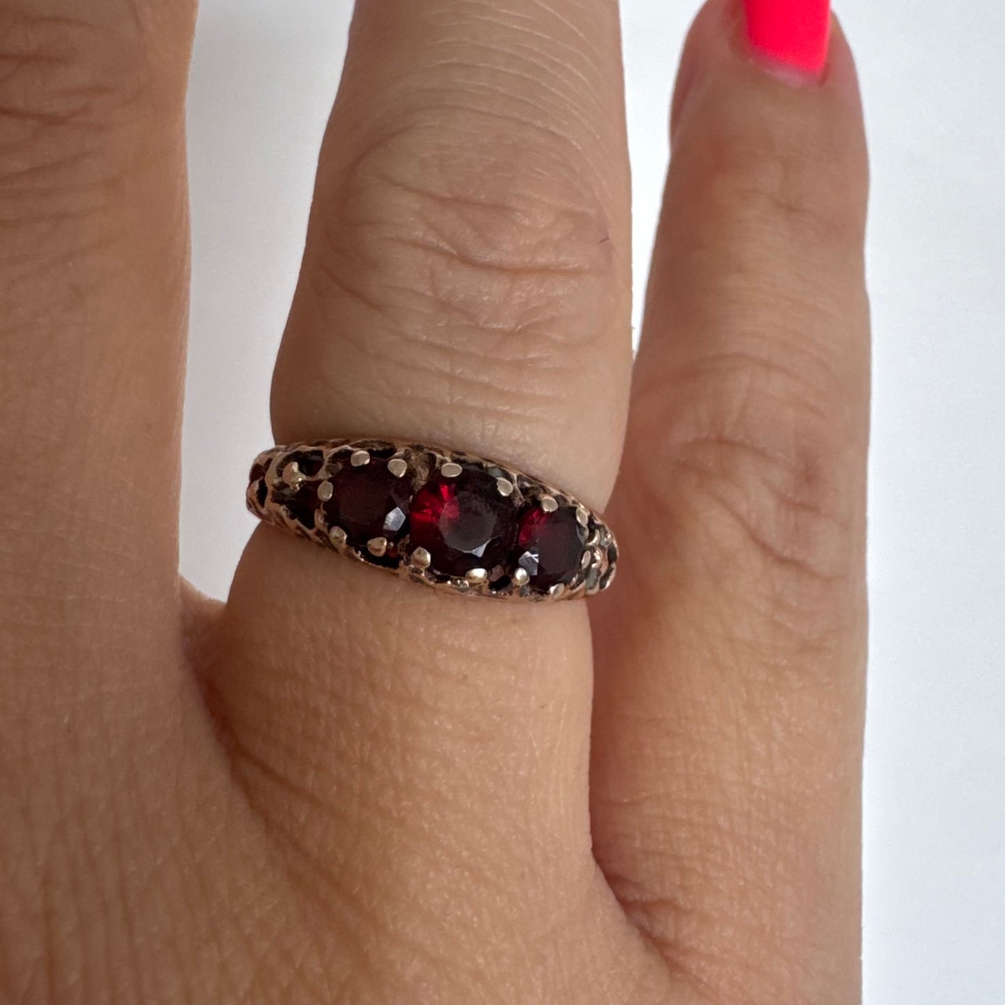 9K gold ring set with deep red Garnet stones