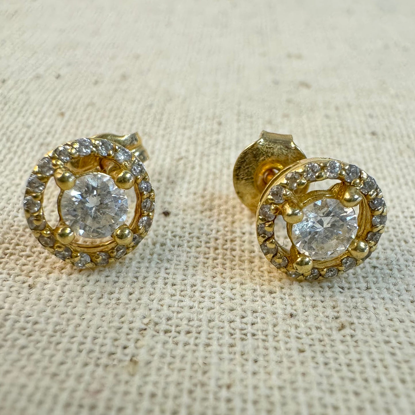 14K gold stud earrings set with Diamonds