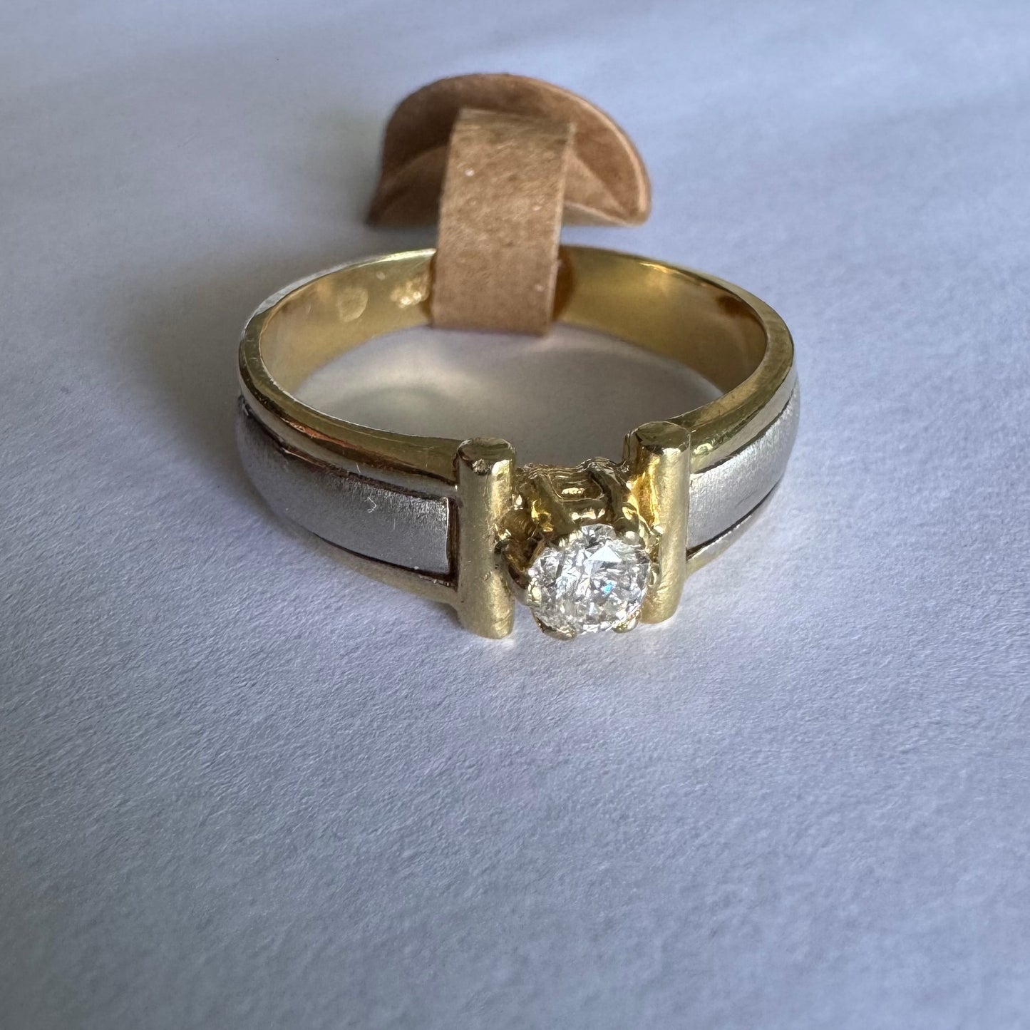 14K two-tone gold ring set with one center Diamond