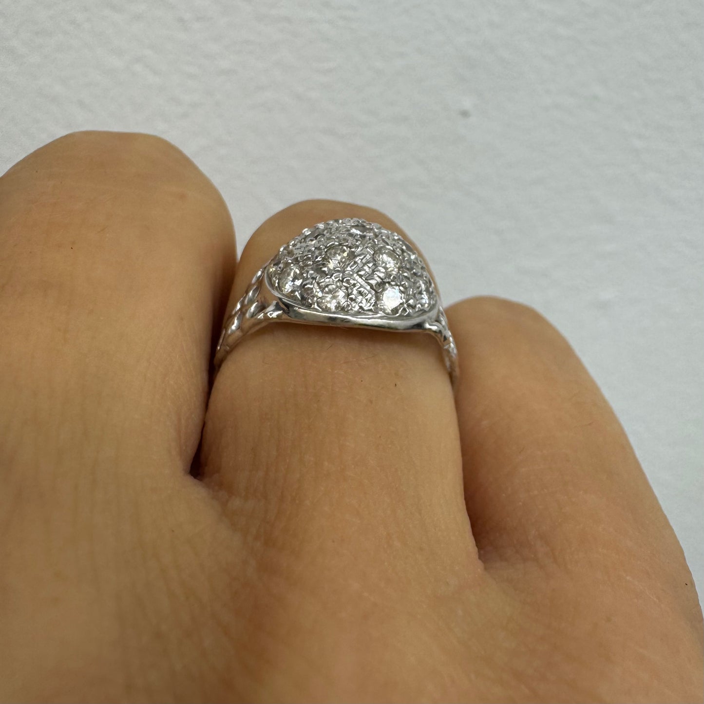 14k white gold ring featuring a domed pavé-style setting covered in sparkling Diamonds