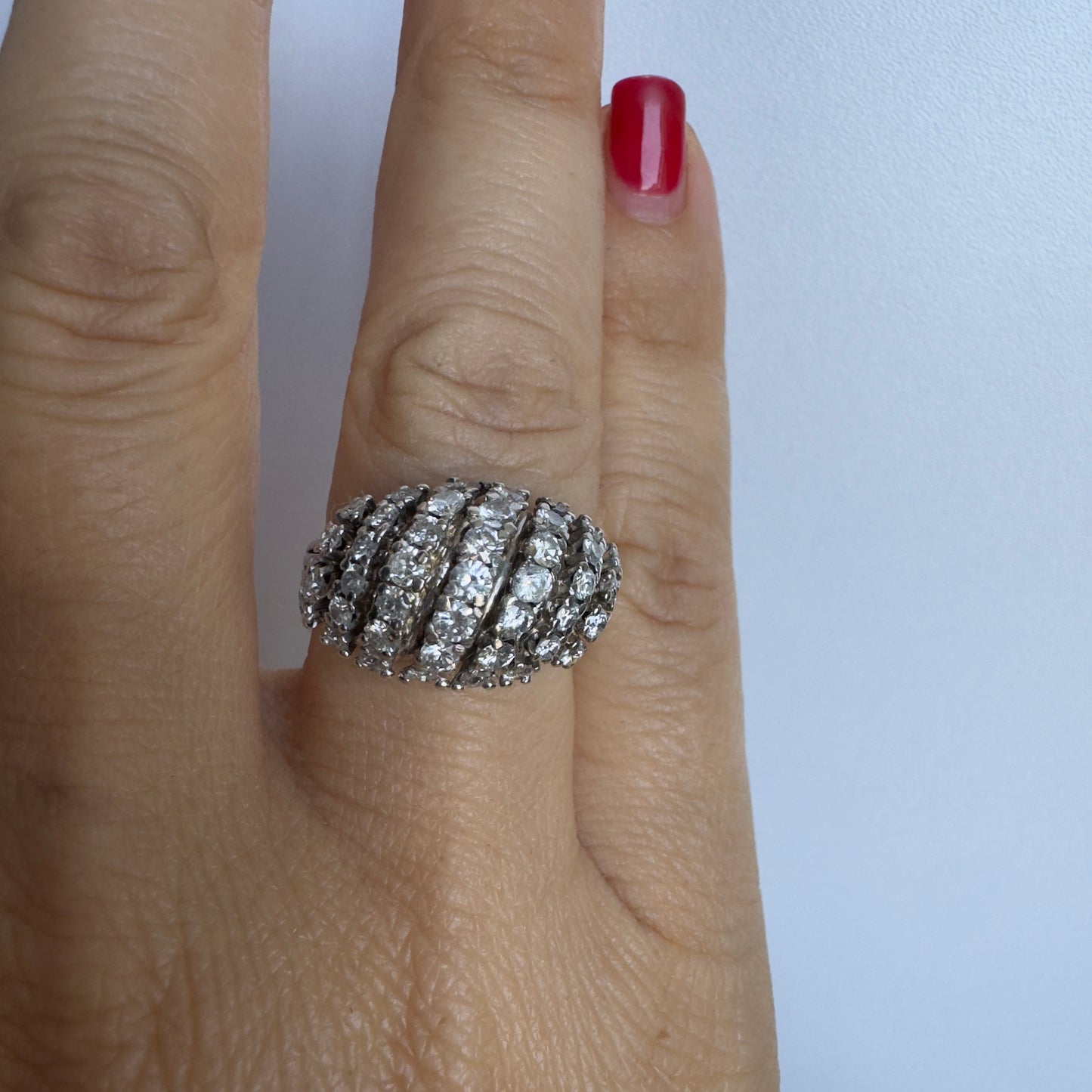 18K gold ring set with rows of sparkling Diamonds in a bold, sculptural design