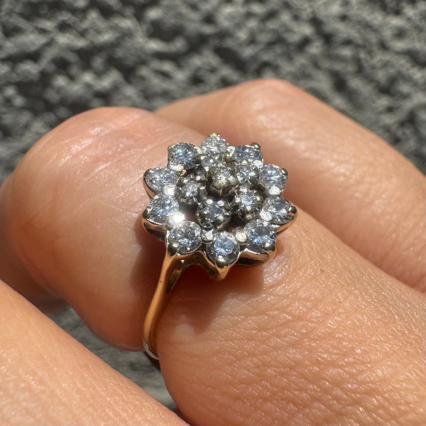 14K gold floral ring set with a dazzling double halo of sparkling Diamonds arranged in a blooming design