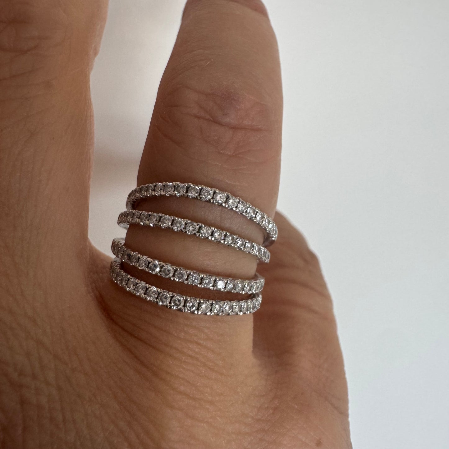 14K gold ring designed with multiple rows of sparkling Diamonds