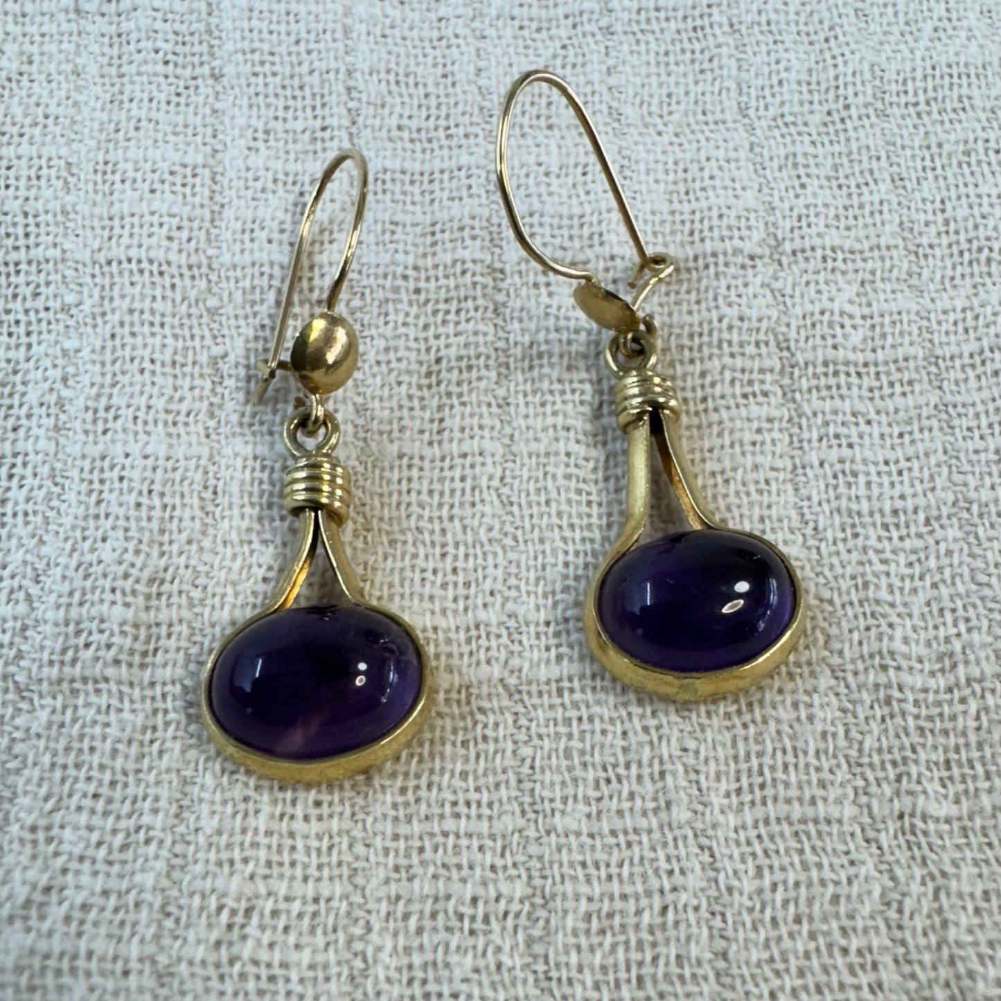 14K gold drop earrings set with Amethyst