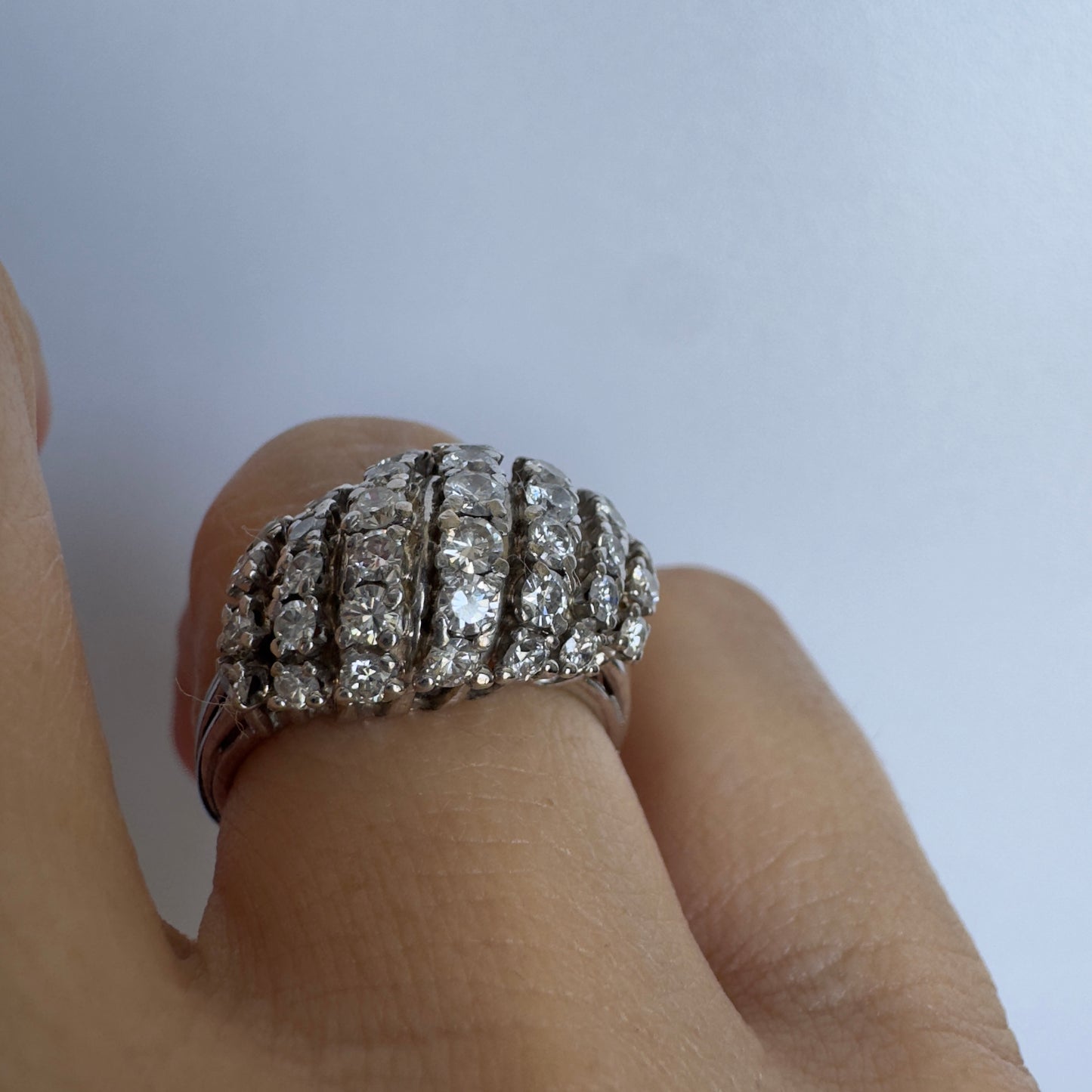 18K gold ring set with rows of sparkling Diamonds in a bold, sculptural design