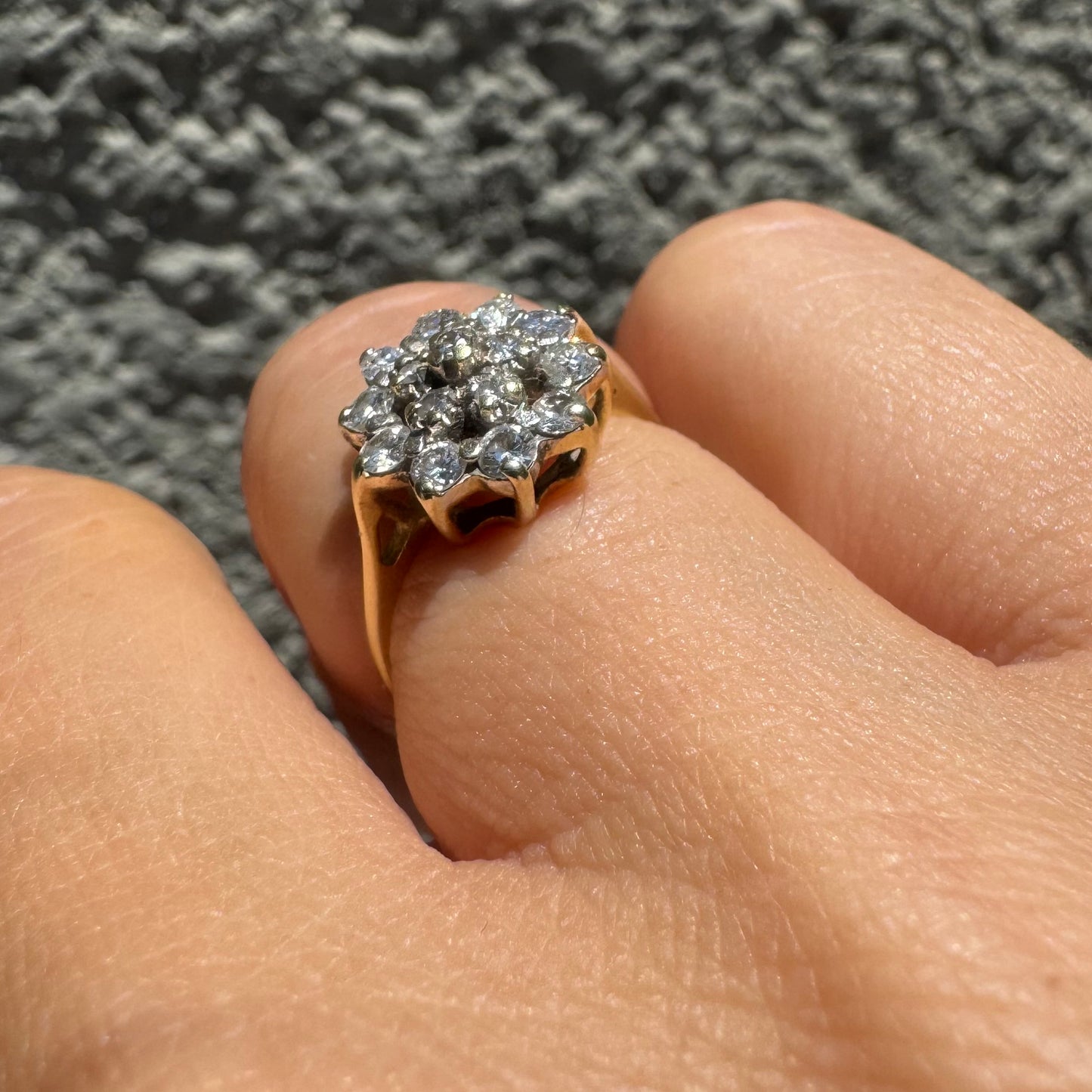 14K gold floral ring set with a dazzling double halo of sparkling Diamonds arranged in a blooming design
