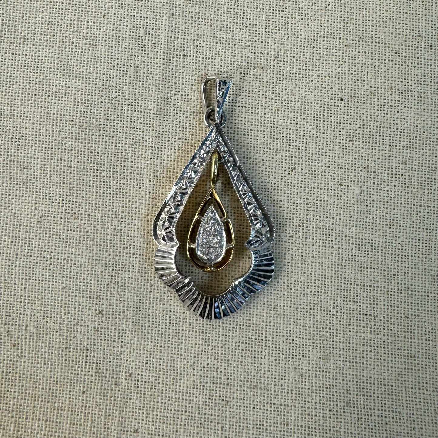 14K gold pendant set with Diamonds