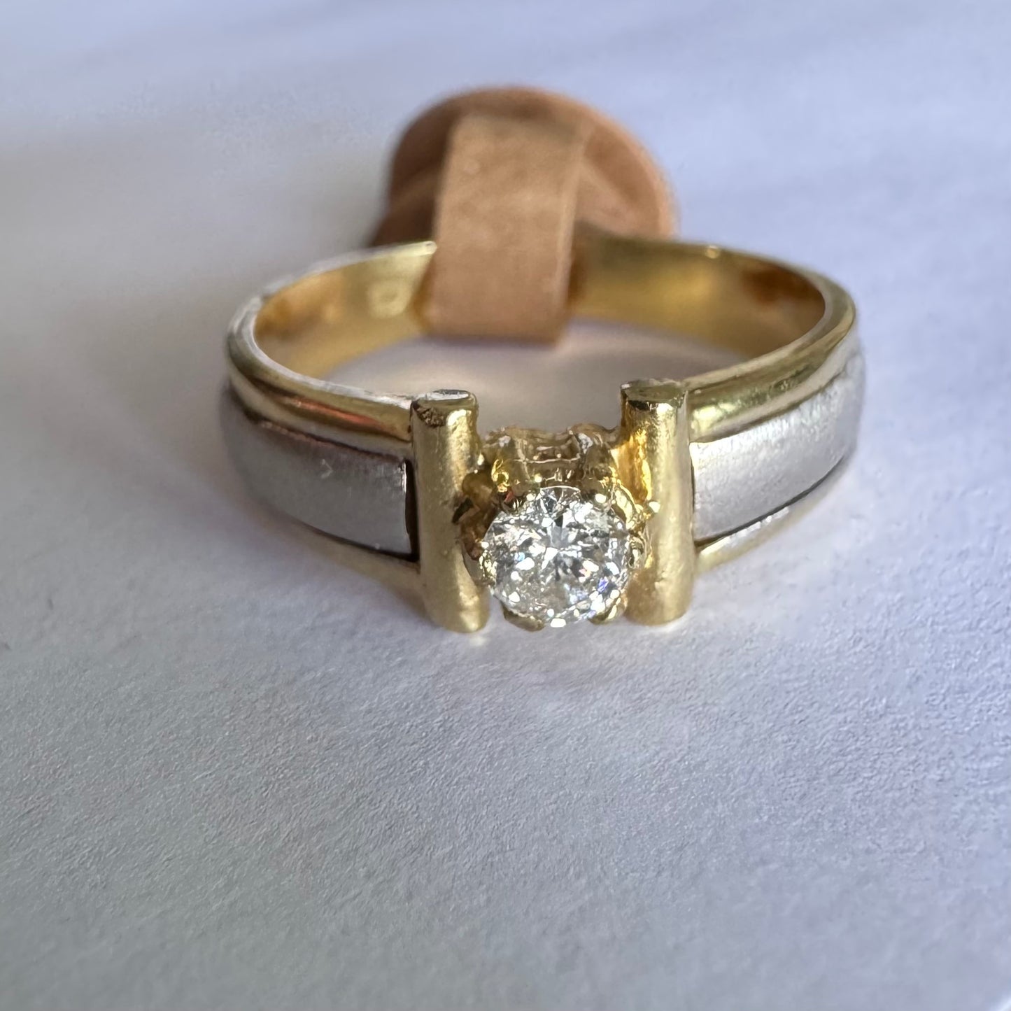 14K two-tone gold ring set with one center Diamond