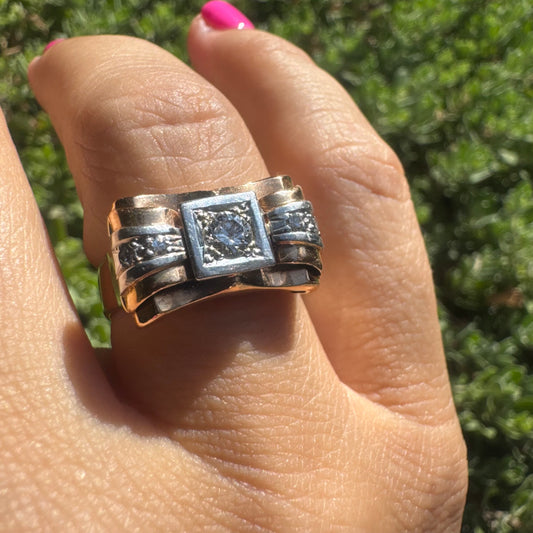 18K gold ring crafted in yellow and white gold, featuring a central Diamond in a square bezel setting