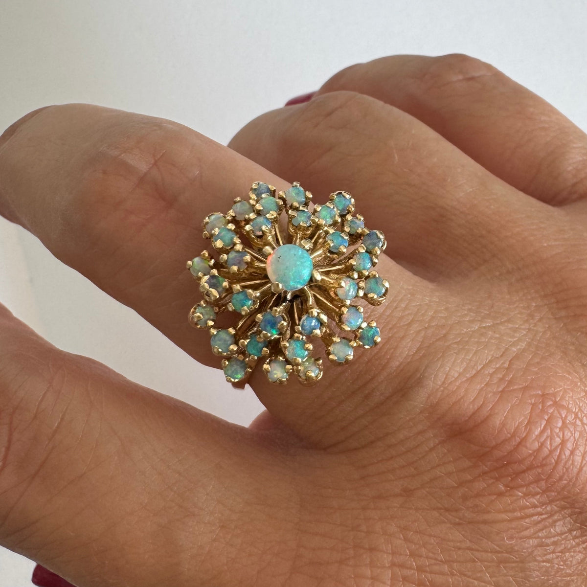 14K gold ring set with Opals