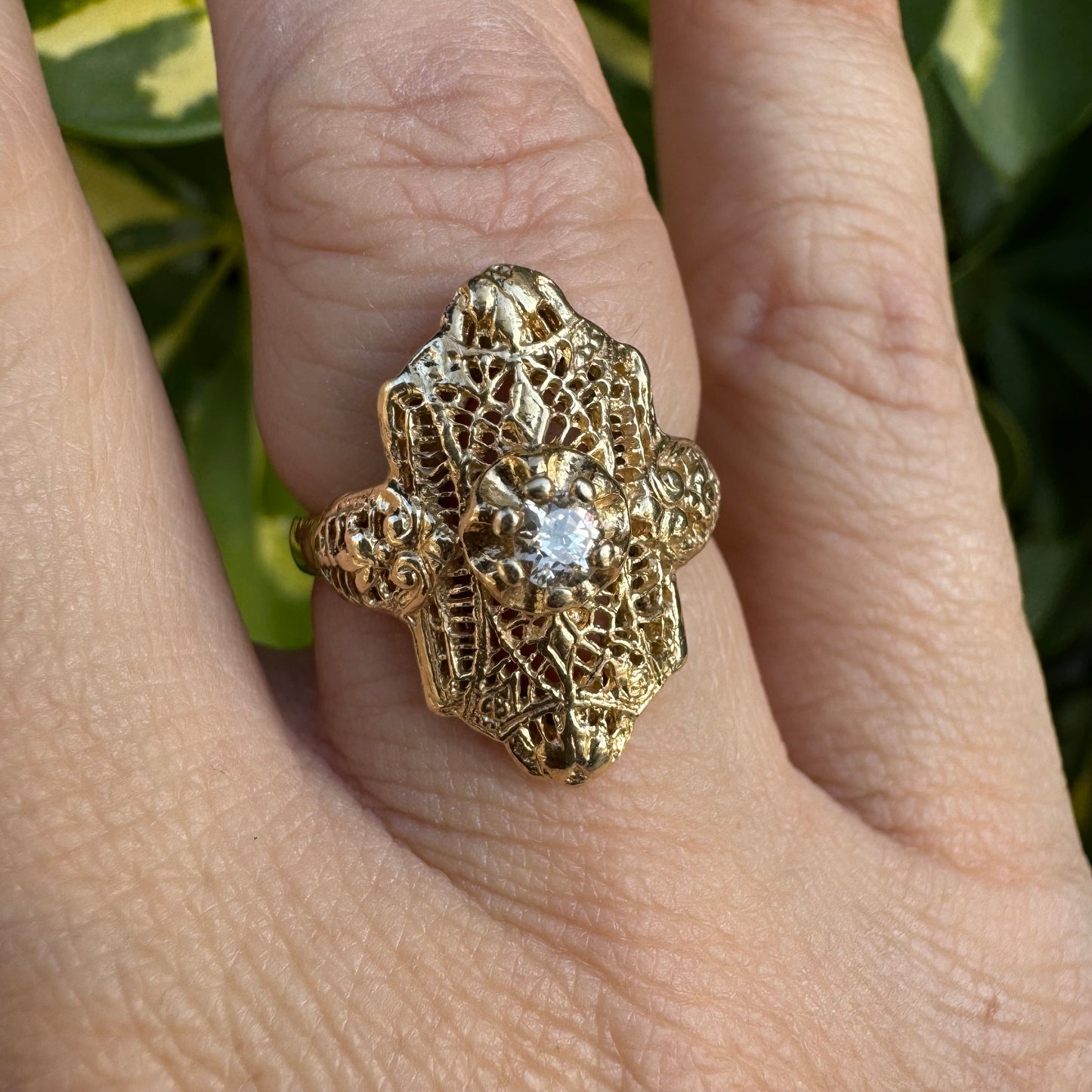 14K gold ring set with a Diamond