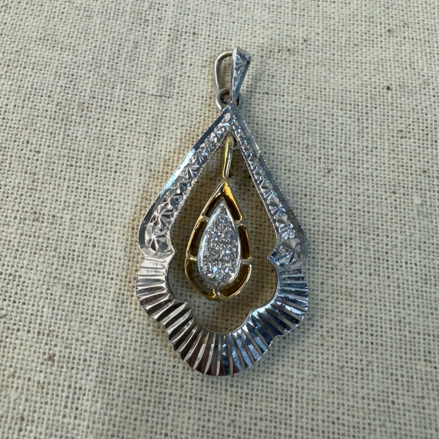 14K gold pendant set with Diamonds