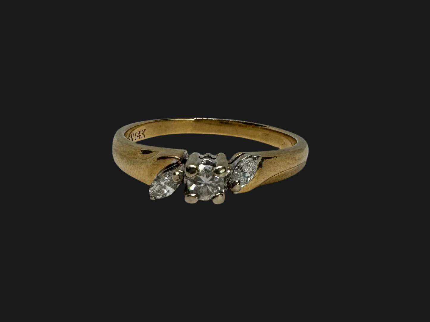 14K gold ring set with Diamonds