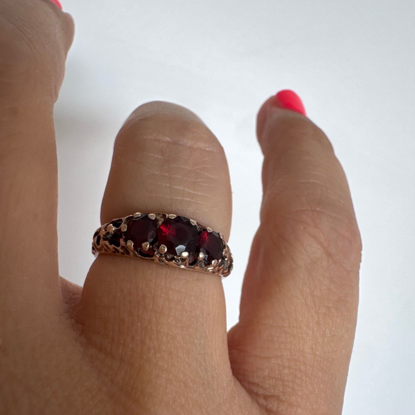 9K gold ring set with deep red Garnet stones
