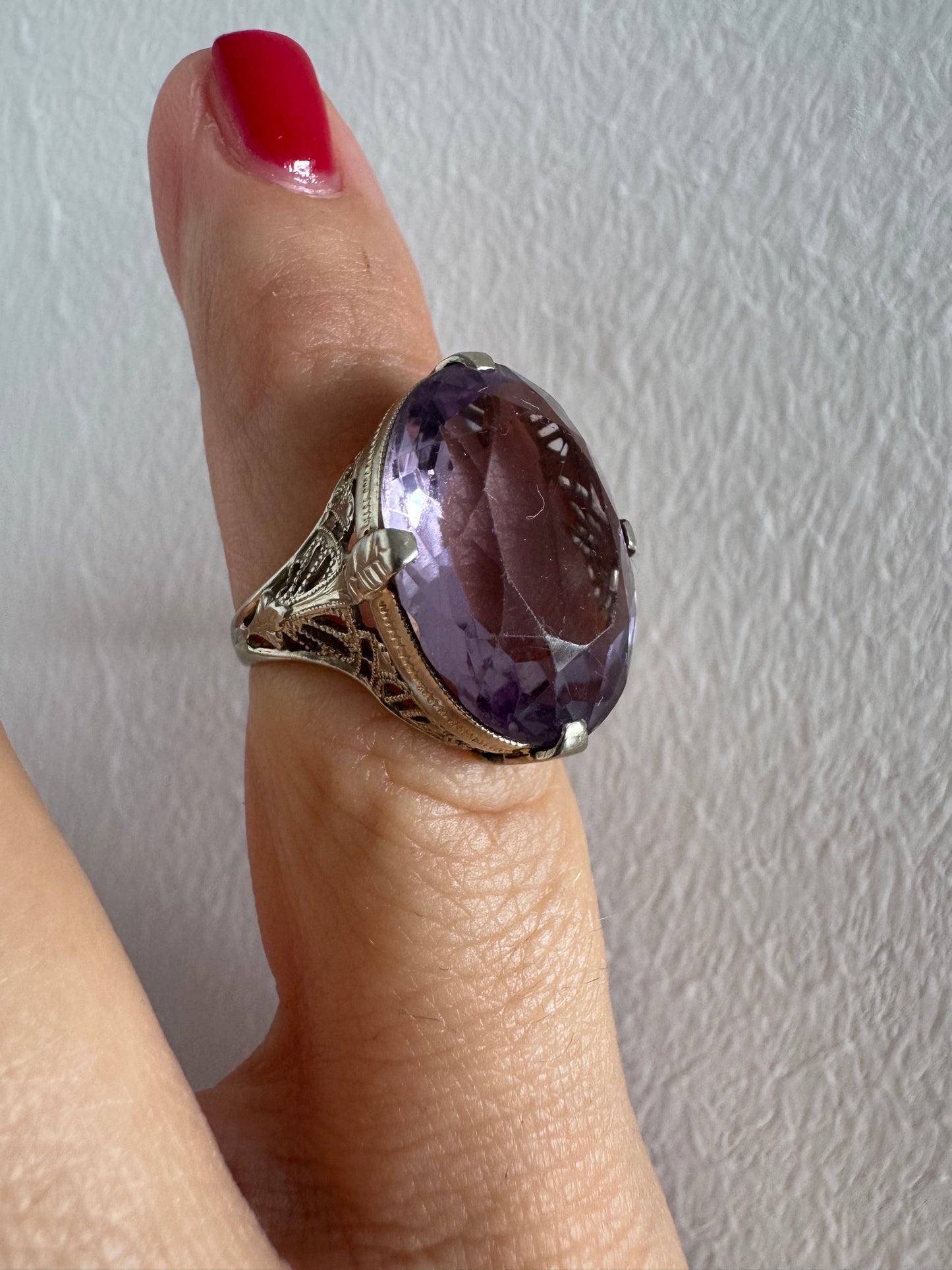 14K gold ring set with a soft purple Amethyst gemstone
