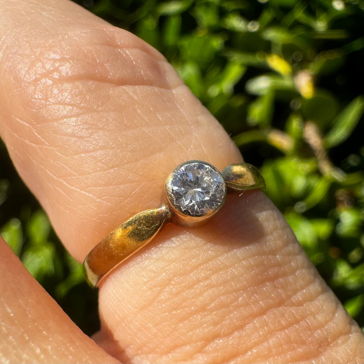 14K gold ring set with one center Diamond