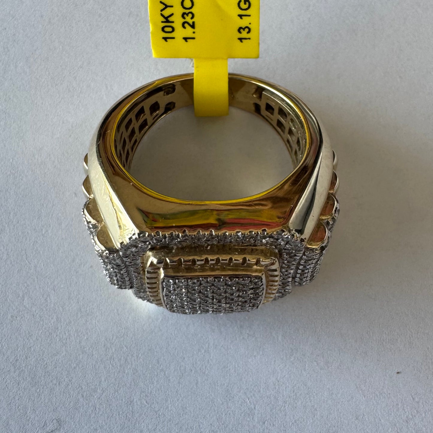 10K gold ring set with sparkling Diamonds in a bold geometric design.