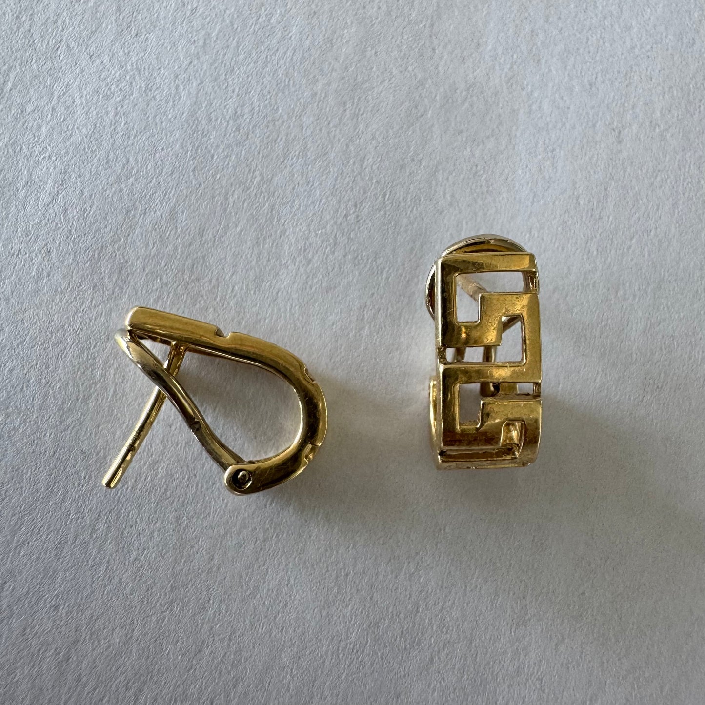 14K gold earrings featuring a geometric design