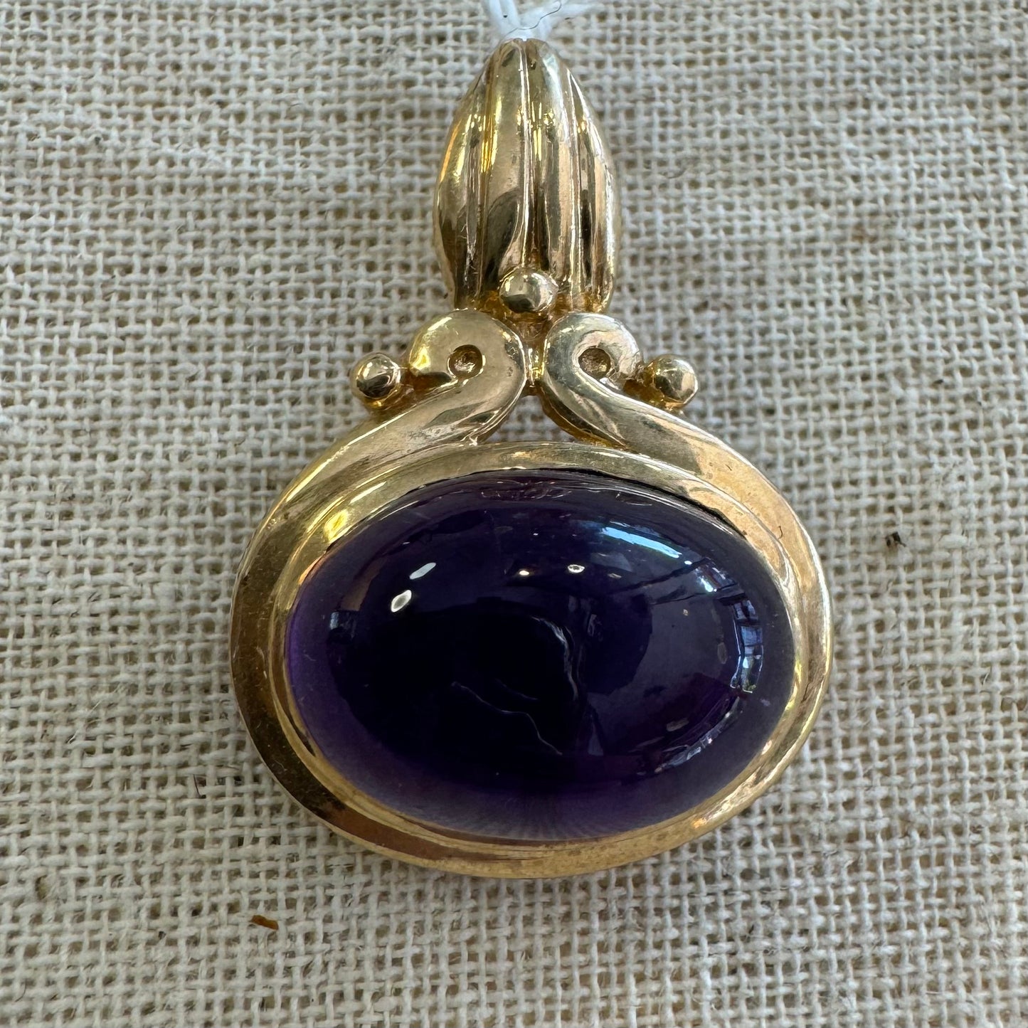 14K gold pendant set with Amethyst