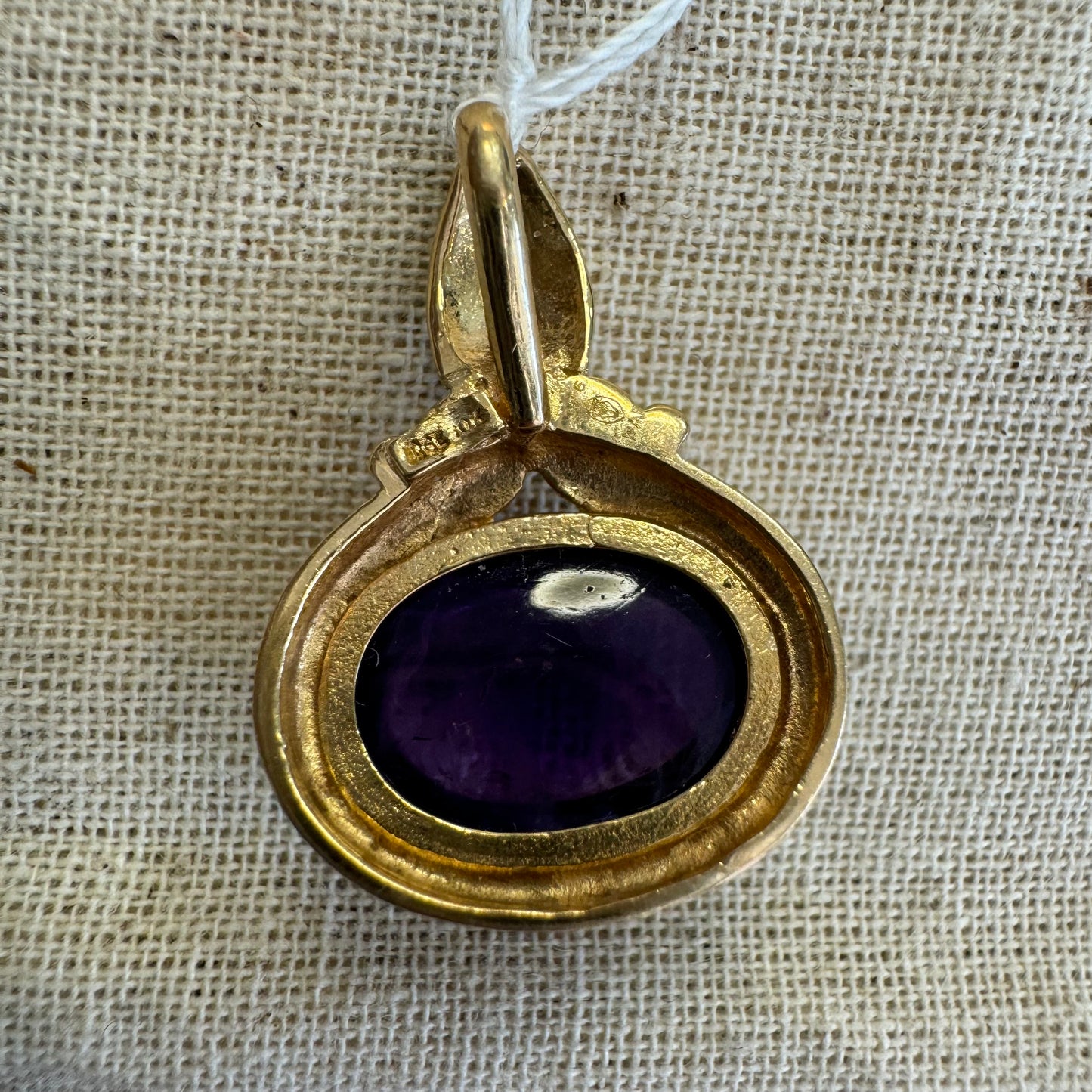 14K gold pendant set with Amethyst