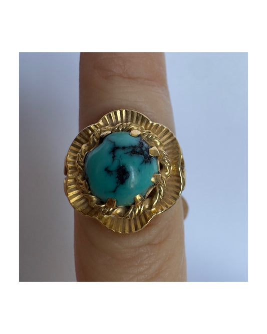 18K gold ring set with a unique Turquoise
