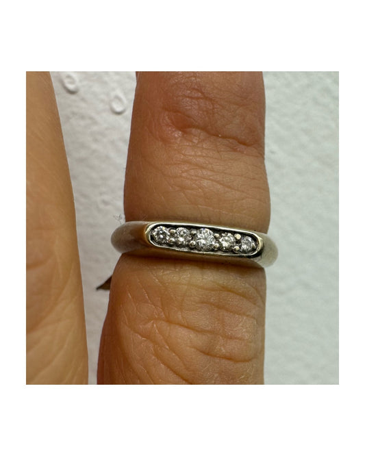 14K white gold ring set with a row of small Diamonds in a clean & classic design.