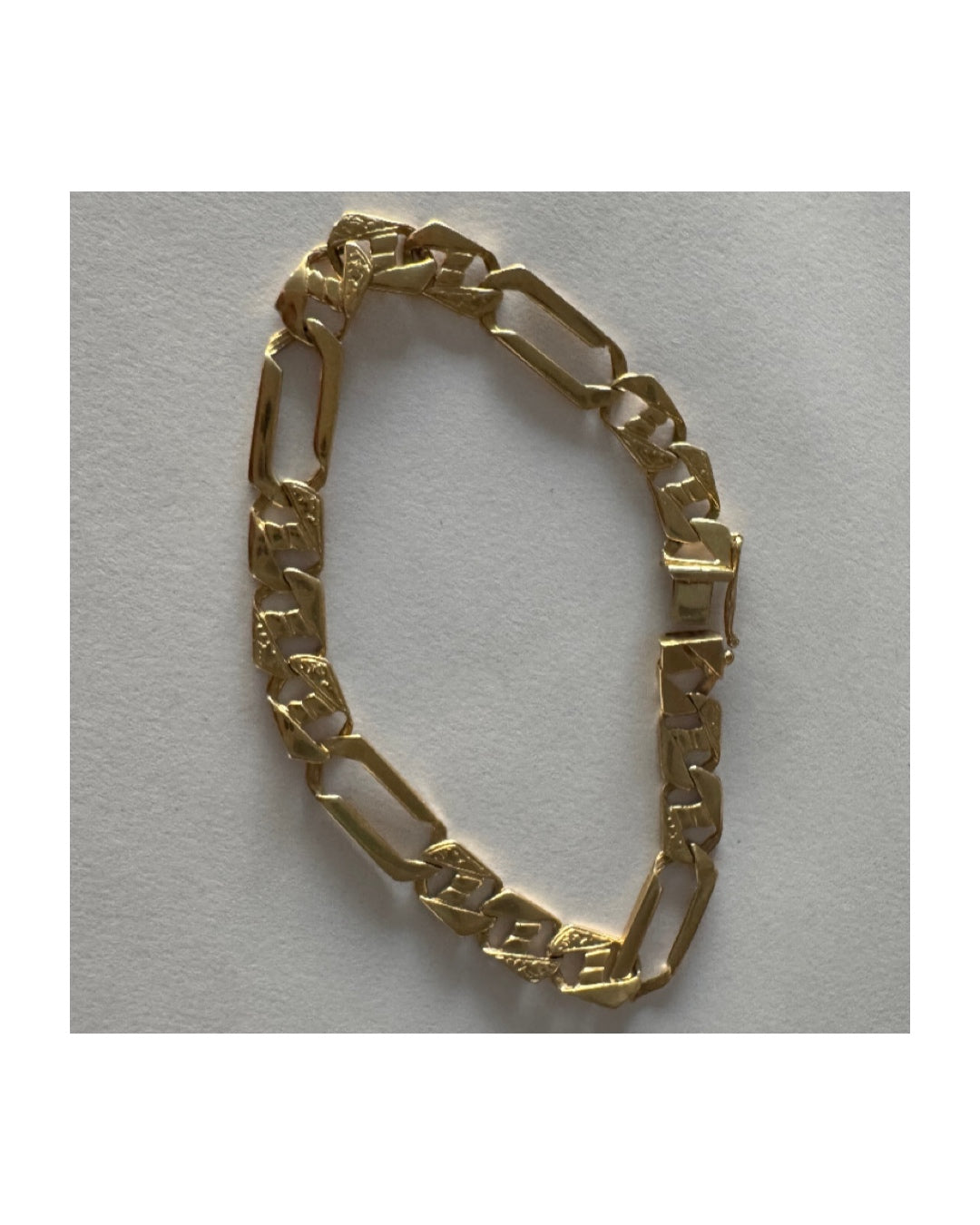 14K gold bracelet with a modern, distinctive link design