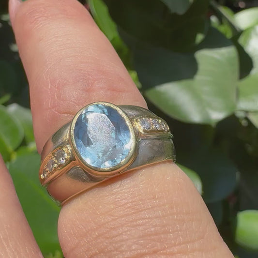 14K gold ring set with Blue Topaz & Diamonds