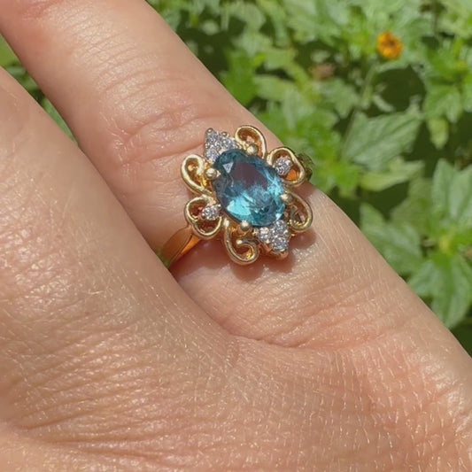 18K gold ring set with Blue Topaz & Diamonds